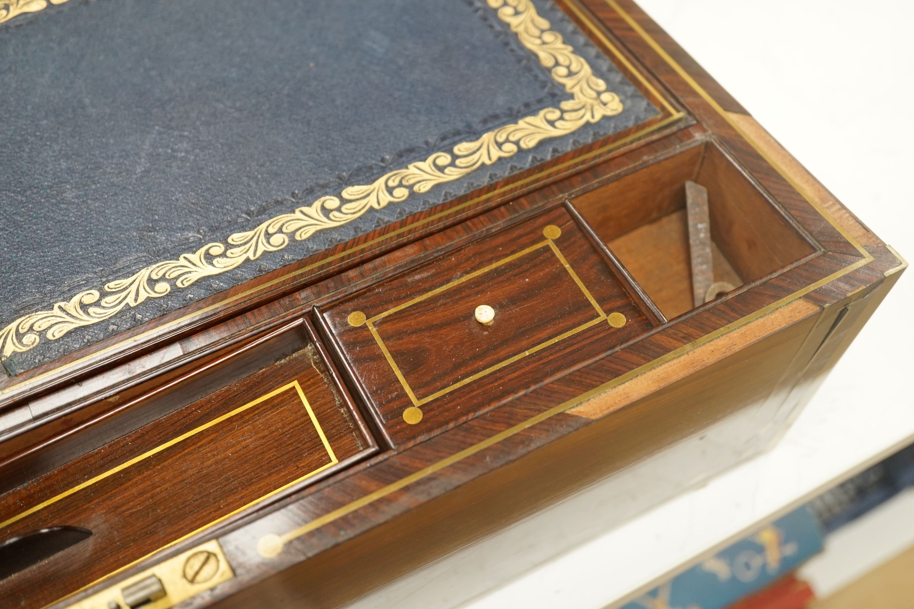A George IV brass bound kingwood writing slope, 52cm